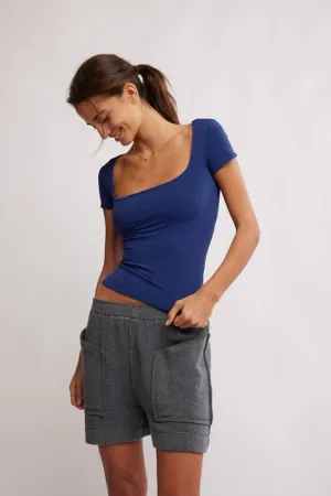 FREE PEOPLE CLEAN LINES BABY TEE IN INDIGO