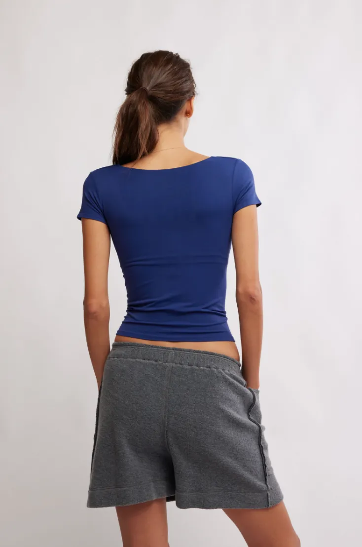 FREE PEOPLE CLEAN LINES BABY TEE IN INDIGO