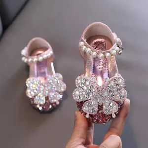 Sequenced Leather Glittery Shoes With A Butterfly And Pearls.